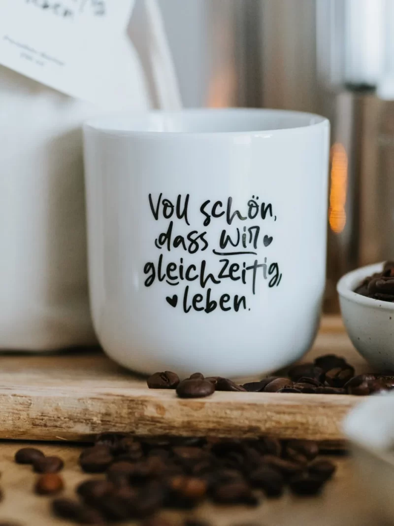 Porzellanbecher Gleichzeitig leben Heldenglück Art. Nr. H314